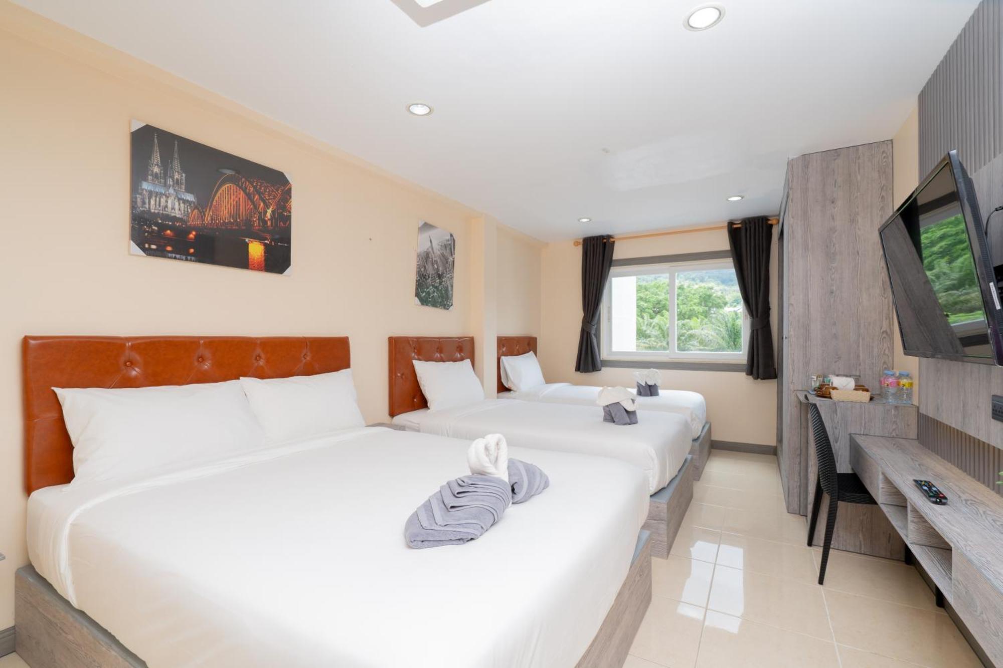 Square One Hotel Patong Extérieur photo