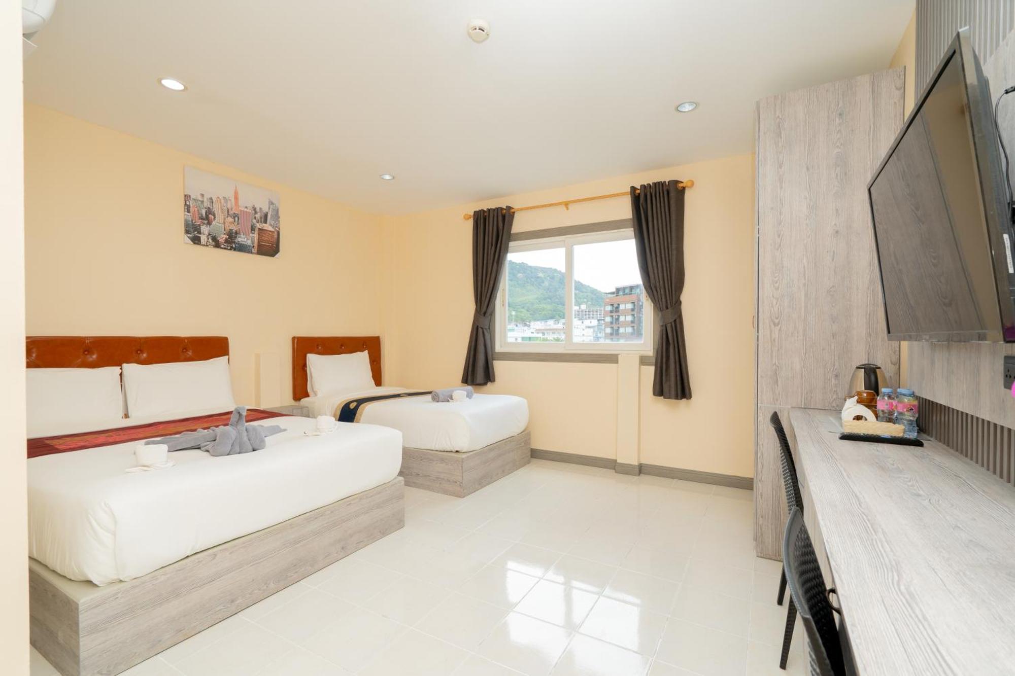 Square One Hotel Patong Extérieur photo
